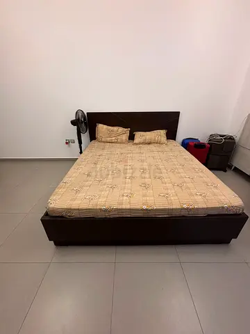 Master bed with mattress and side table
