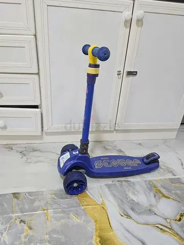 Blue three-wheel kids scooter - good condition