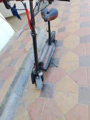 Used Electric Scooter with Seat - Good Working Condition