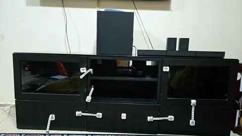 Black TV Entertainment Unit with Glass Doors — Good Condition