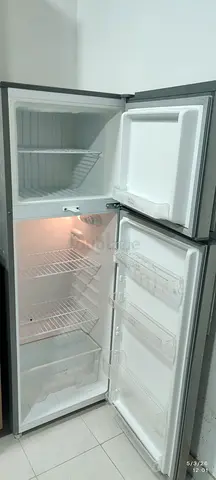 Used top-freezer refrigerator in good working condition - 2-door westpoint