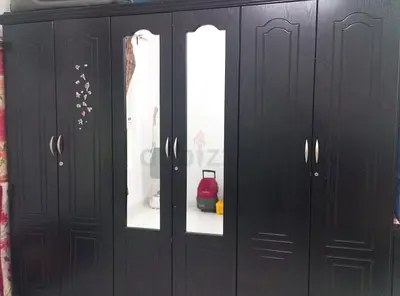 6-door dark wood wardrobe with mirrored panels
