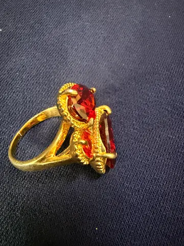 Gold-tone ring with two red gemstones (vintage style)