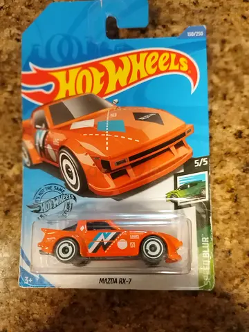Hot Wheels Mazda RX-7 (sealed carded) - orange collector car
