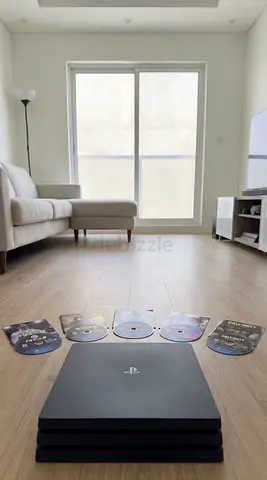 Sony PS4 Pro 1TB with 5 Games (FIFA 18, The Last of Us, Uncharted 4, FIFA 21, COD WWII) and Cables