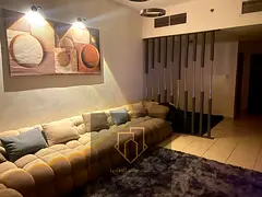 For sale: Three bedrooms, a living room, and a maid's room in Ajman One Towers.