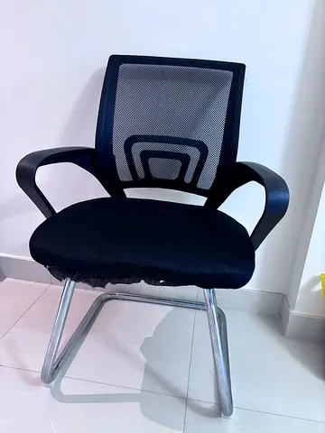 Used black mesh office visitor chair with chrome sled legs