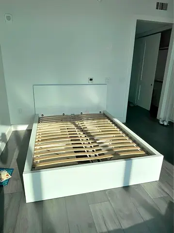Ikea White platform bed frame with slatted base - queen size