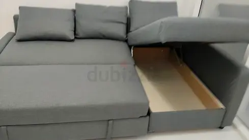 Grey L-shaped Sofa Bed with Storage - Good Condition