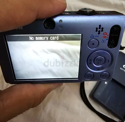 Canon Used compact digital camera - powers on, with 2GB memory card