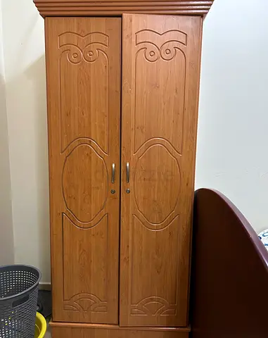 Tall wooden 2-door wardrobe / armoire in good used condition