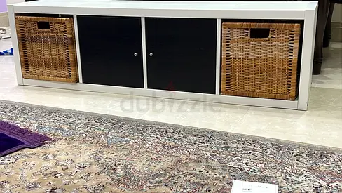 A TV unit in good condition for only 70 dirhams.