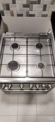 Used 4-Burner Stainless Steel Gas Stove with Oven - Good Working Condition - well maintained
