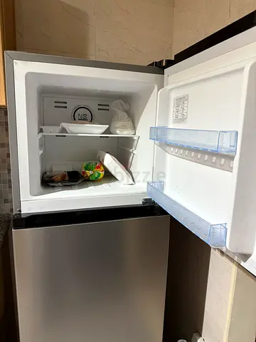 Compact single-door refrigerator with top freezer - good working condition