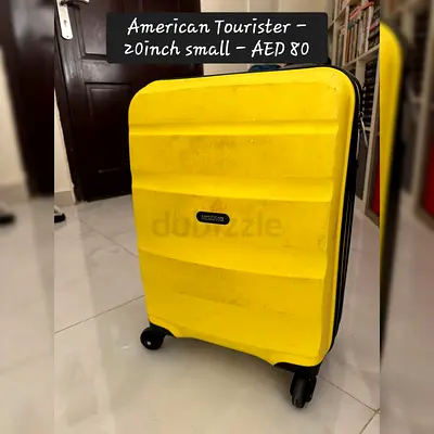 Yellow American Tourister Hard Shell Suitcase (Used)