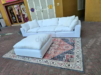 Luscious feather filled sofa with footstool