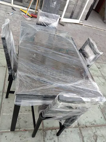 Dining table with 4 chairs - dark wood, good condition