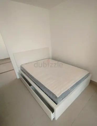 IKEA malam queen‑size bed (160 × 200 cm) with 2 storage drawers underneath and an IKEA mattress ✨
