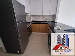 Spacious 2BHK | 1254 SQFT | Kitchen Appliances | Prime Location in Liwan