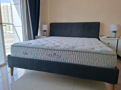 King-size upholstered bed frame with mattress - good condition