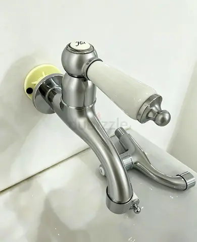 Wall-mounted chrome-plated bathroom faucet