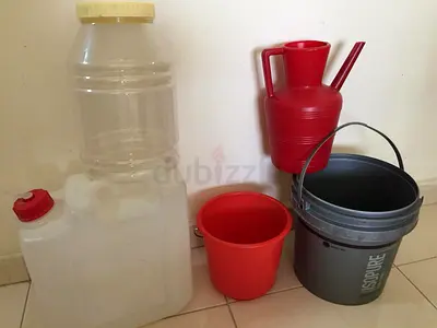 Set of plastic buckets, jerry can and watering can - used