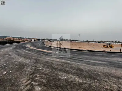 ارض للبيع شارع رئيسي شامل رسوم التسجيل تملك حر