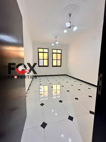 1 bedroom hall for rent in Al Rawda 3 near Sheikh Ammar Street prime location with easy access to Dubai and Sharjah practical layout ideal for familie