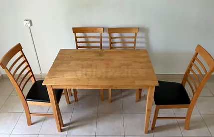 IKEA wooden dining table with chairs