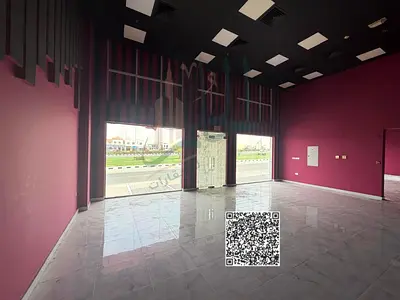 معرض تجاري علس الشارع الرئيسي
