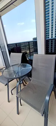 Outdoor balcony bistro set — 2 chairs + glass table (used)