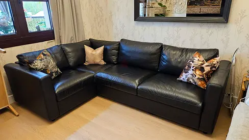Black leather Vimle L-shaped corner sofa bed for sale.