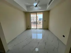 For annual rent in Al Jurf 3, Ajman - 2 bedrooms and a living room, brand new building, first occupa