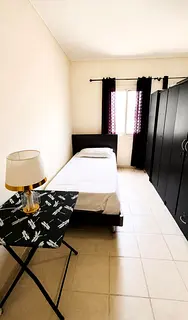 Looking for a Decent EXECUTIVE BACHELOR SHARING MASTER BEDROOM for 1700 AED