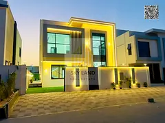 Luxury villa with a stunning swimming pool for sale in Al Zahia, Ajman, including fees, water, and e