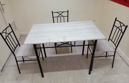 Dining table with 3 chairs all in good condition.urgent i need to sell it today.only pick up.