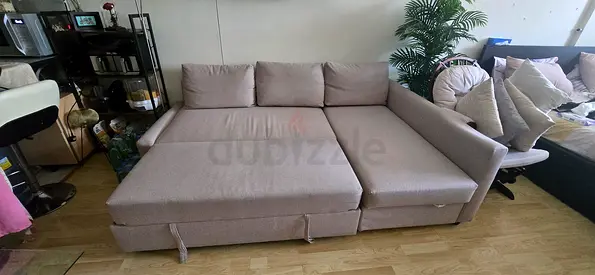 Beige L-shaped Sofa with Storage — Good Condition