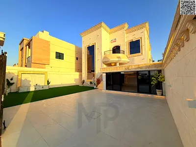 فيلا للبيع في المويهات عجمان أول ساكن سكني تجاري 5000 قدم 5 غرف ماستر طابقين وروف حوش كبير وشلال تشطيب سوبر ديلوكس موقع رئيسي