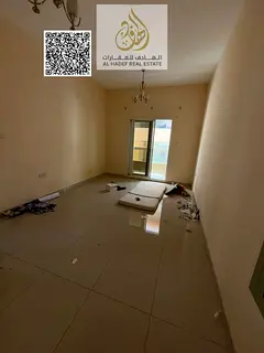 ONE-bedroom apartment with a living room, annual rent in Al Rawda 1