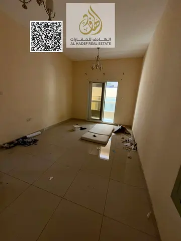 ONE-bedroom apartment with a living room, annual rent in Al Rawda 1