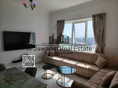 One bedroom and living room apartment for sale in Al Waha Towers, installment payments remaining, fu