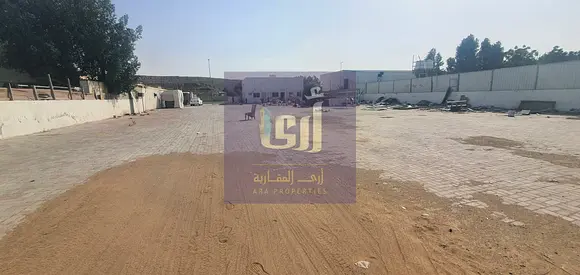 20,000 sqft plot on main road Al Madam. 3 shops, 3 offices. Best for business use.