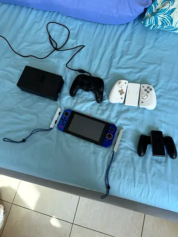 Nintendo switch 1 with Zelda joycons and with joycons imported from Canada