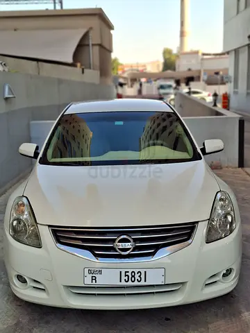 Altima 2012 at its best, driven by my son, we are not a dealer