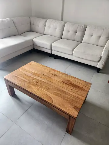 Light grey L-shaped fabric sofa with solid wood coffee table - good condition