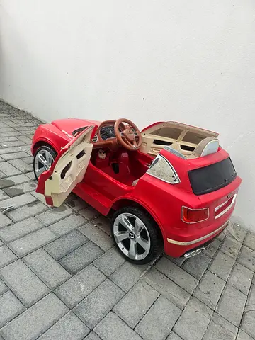 Red Kids Electric Ride-On Car (1 Seater) - Used needs battery replacement