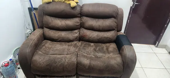 Brown 3+ 2-seater reclining sofa (used) - comfortable and sturdy