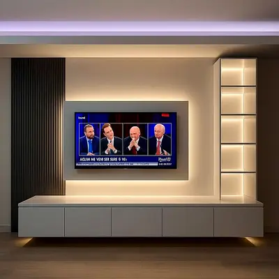 Modern built-in entertainment center with LED backlighting and display shelves