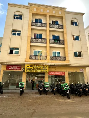 For sale: a building in the commercial area of Muwailih. Ground floor + 3 floors on an 18-meter street with a 10% income.