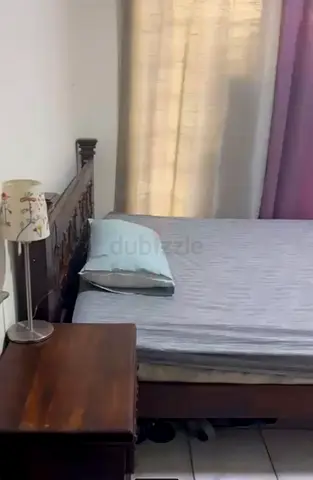 Family sharing room with balcony next to Burjuman Metro